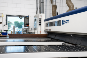 CNC cutting equipment fabricating custom components for industrial piping systems